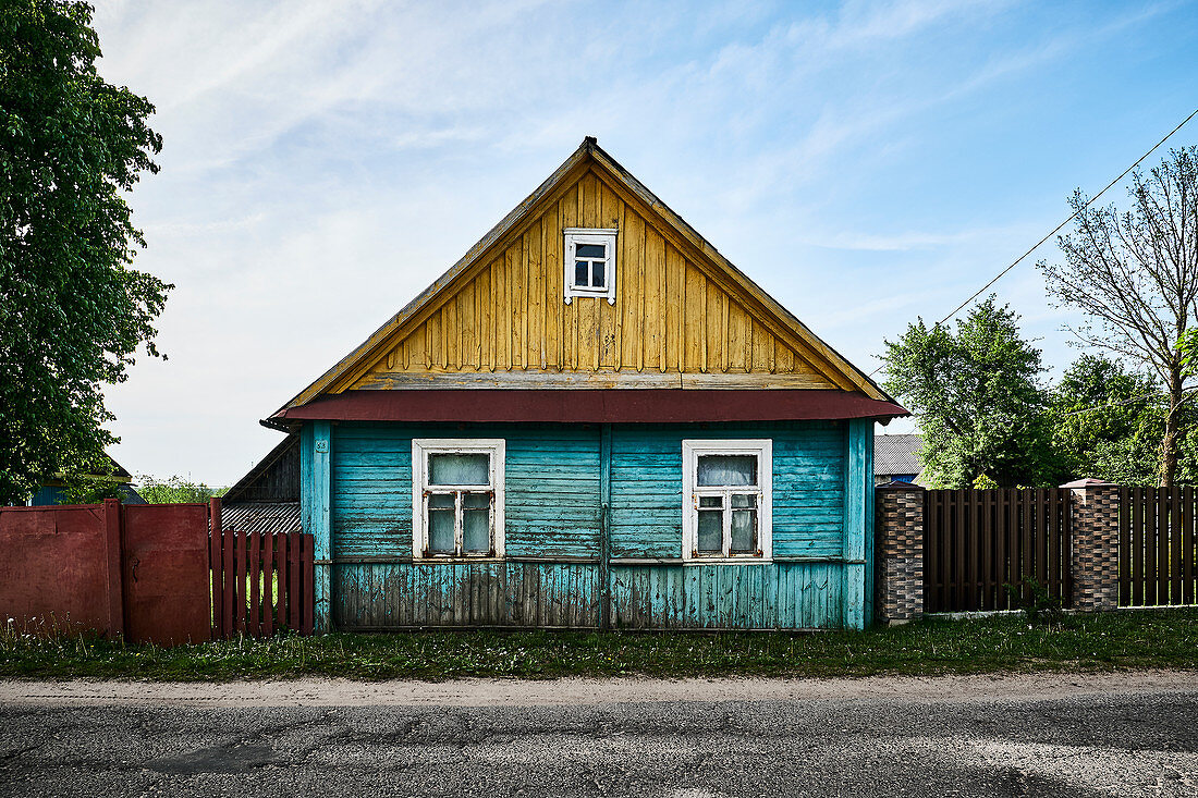 A traditional old weathered wooden home in the Grodno region of Belarus.