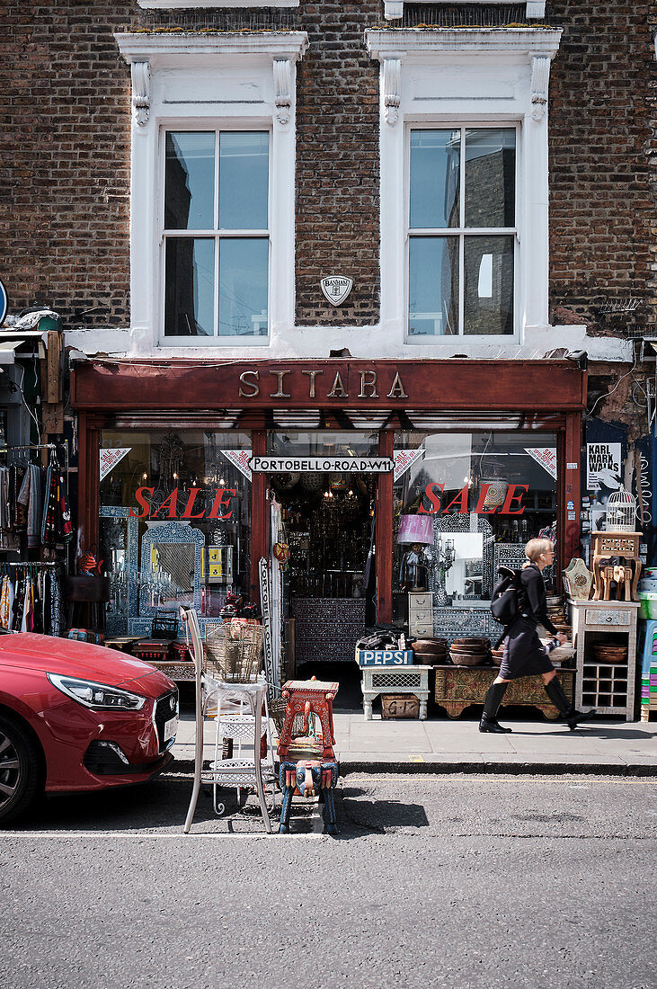 Streetscape of a homewares shop on Portobello Road, Notting Hill, London, UK.