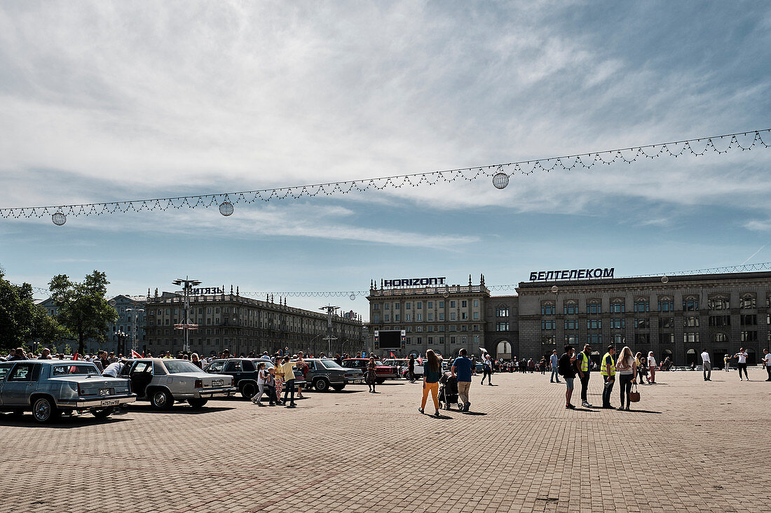View across Kastryčnickaja plošča (Kastrycnickaja Square) in Minsk Belarus during a vintage car show.