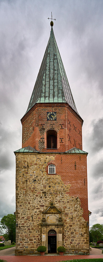 Tower with entrance portal of St. Urbanus Church Dorum, Nieersachsen, Germany