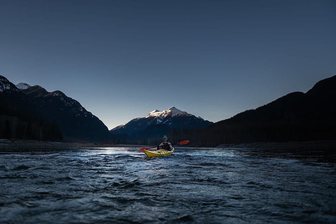 Canada, British Columbia, Woman kayaking in Squamish River