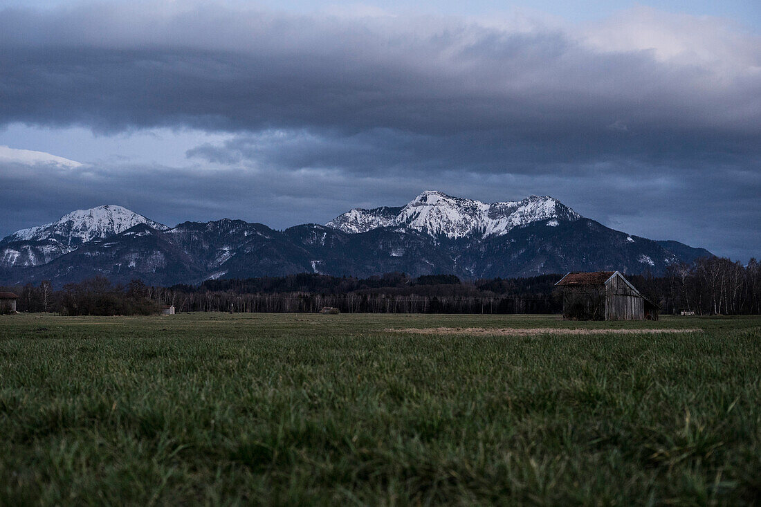View of the Hochfelln (left) and the Hochgern (right) at dusk, Übersee, Bavaria, Germany