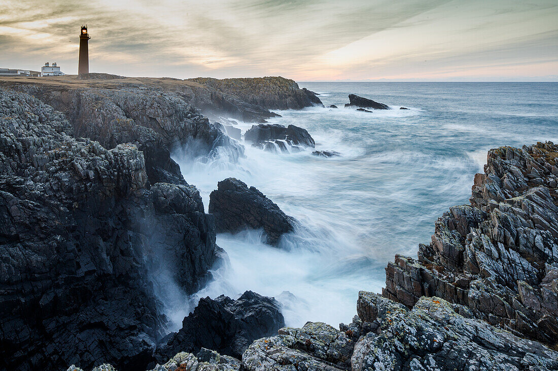 Lighthouse at Butt of Lewis Hebrides, rocky coast, northern tip of the Outer Hebrides, Scotland UK