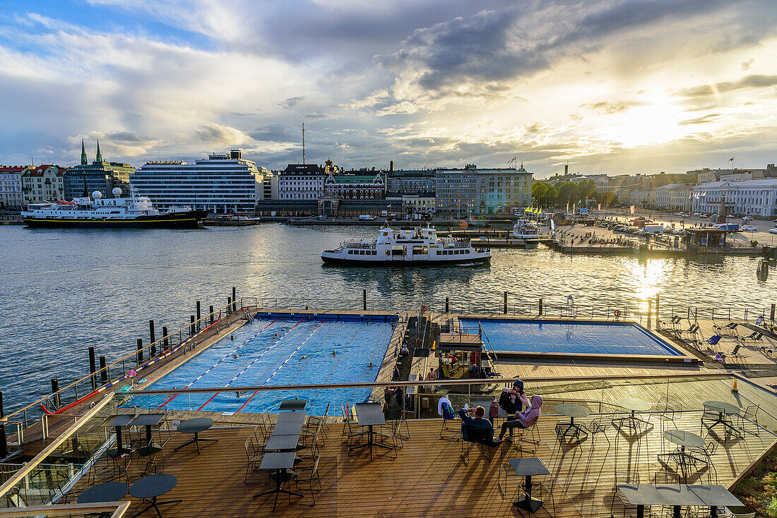 Allas Sea Pool, people bathing in the pool embedded in the harbor basin, Helsinki, Finland