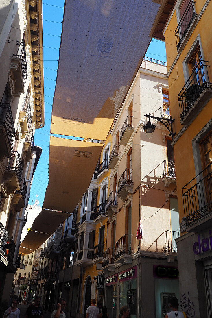 Shaded pedestrian street in Malaga, Andalusia, Spain
