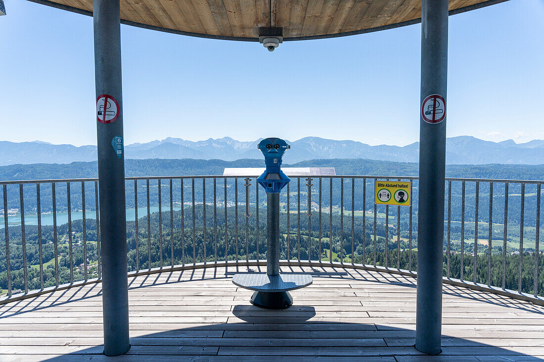 Stand telescope with a view of the Alps from Pyramidenkogel, Carinthia, Austria