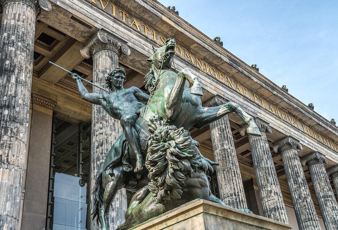 Statue of lion fighter by Albert Wolff in front of the Altes Museum in Berlin, Germany