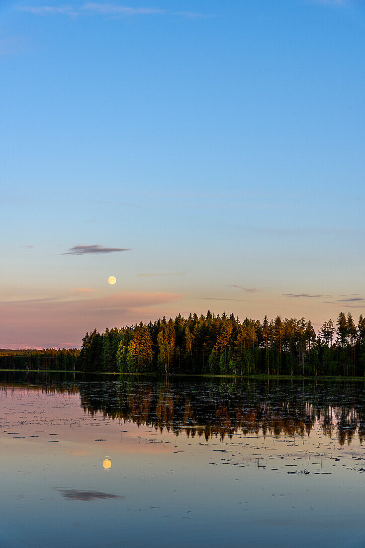 Landscape with a full moon on the Lake District, Finland