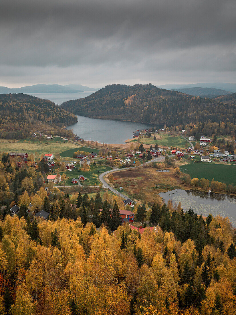 Landscape panorama with islands of Höga Kusten on Mount Stortorget in the east of Sweden in autumn