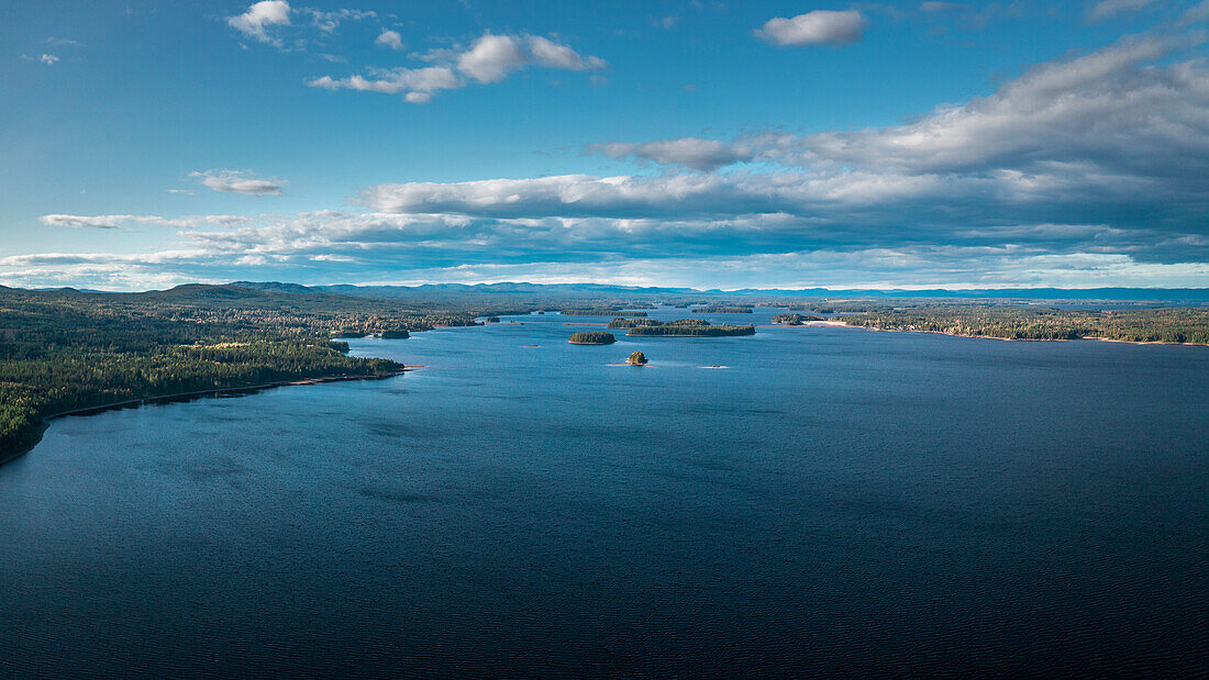 Lake Siljan from above with blue sky in Dalarna, Sweden