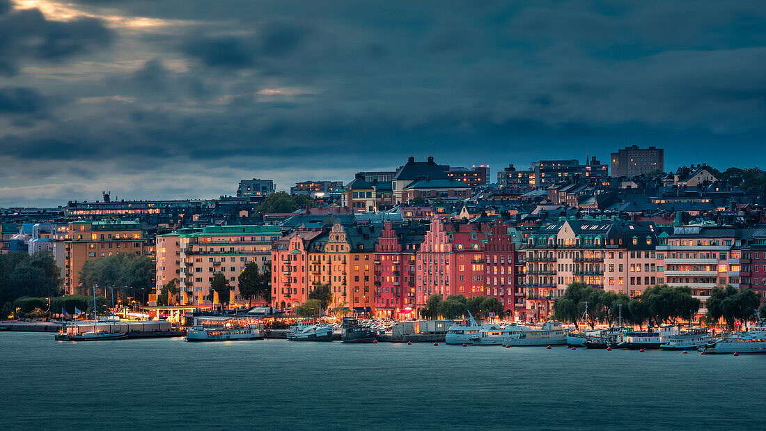 Colorful illuminated house facades of Kungsholmen in Stockholm in Sweden at night