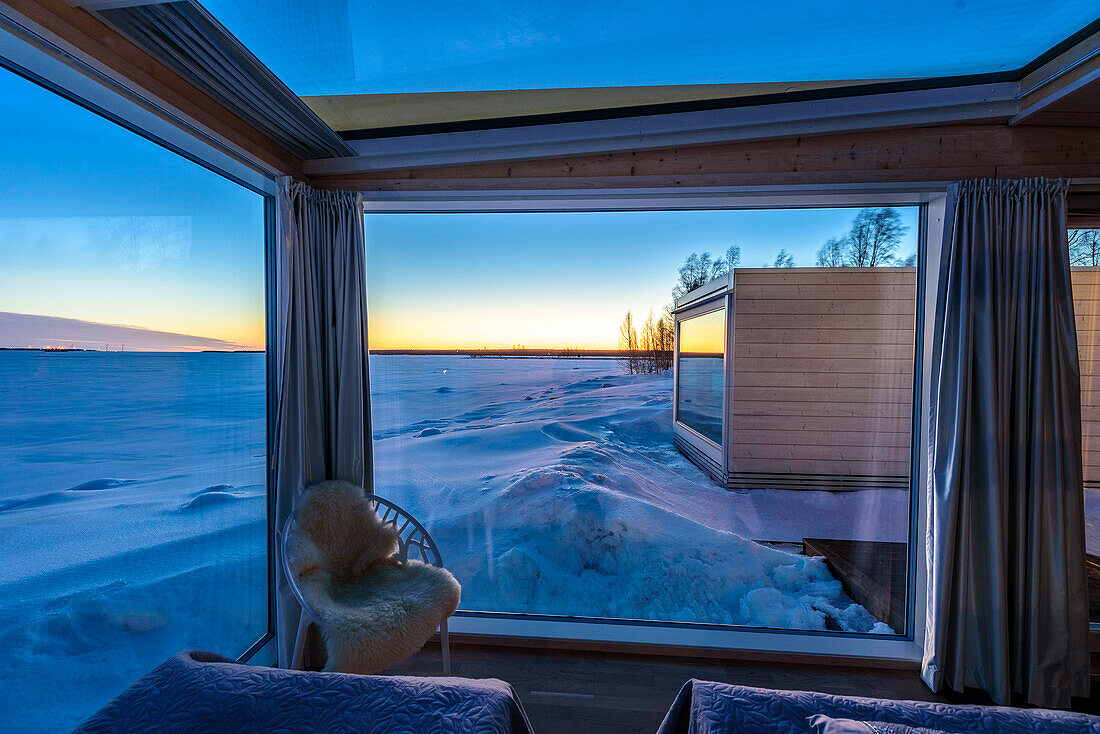 Seaside Glass Villas accommodation next to the Lumilinna Snow Hotel in Kemi, Finland