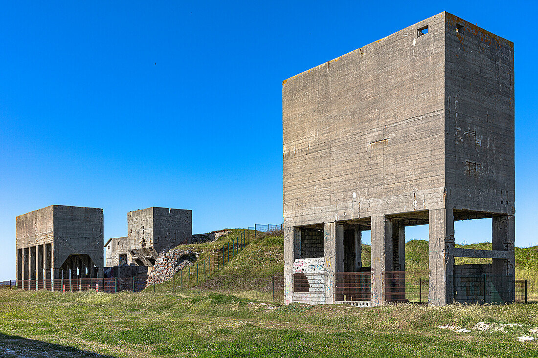 France, Bretagne, Abandoned concrete buildings in landscape