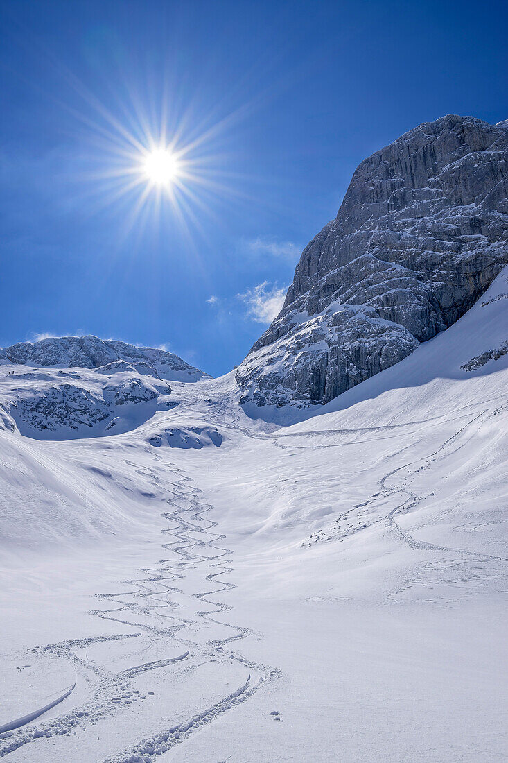 Two downhill tracks in a wide snow slope, Hoher Göll, Berchtesgaden Alps, Berchtesgaden National Park, Upper Bavaria, Bavaria, Germany