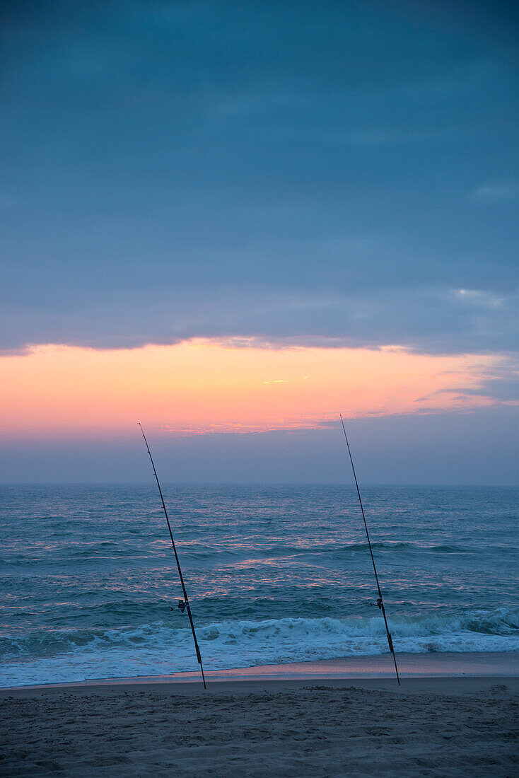 Fishing rods in the evening mood on the North Sea