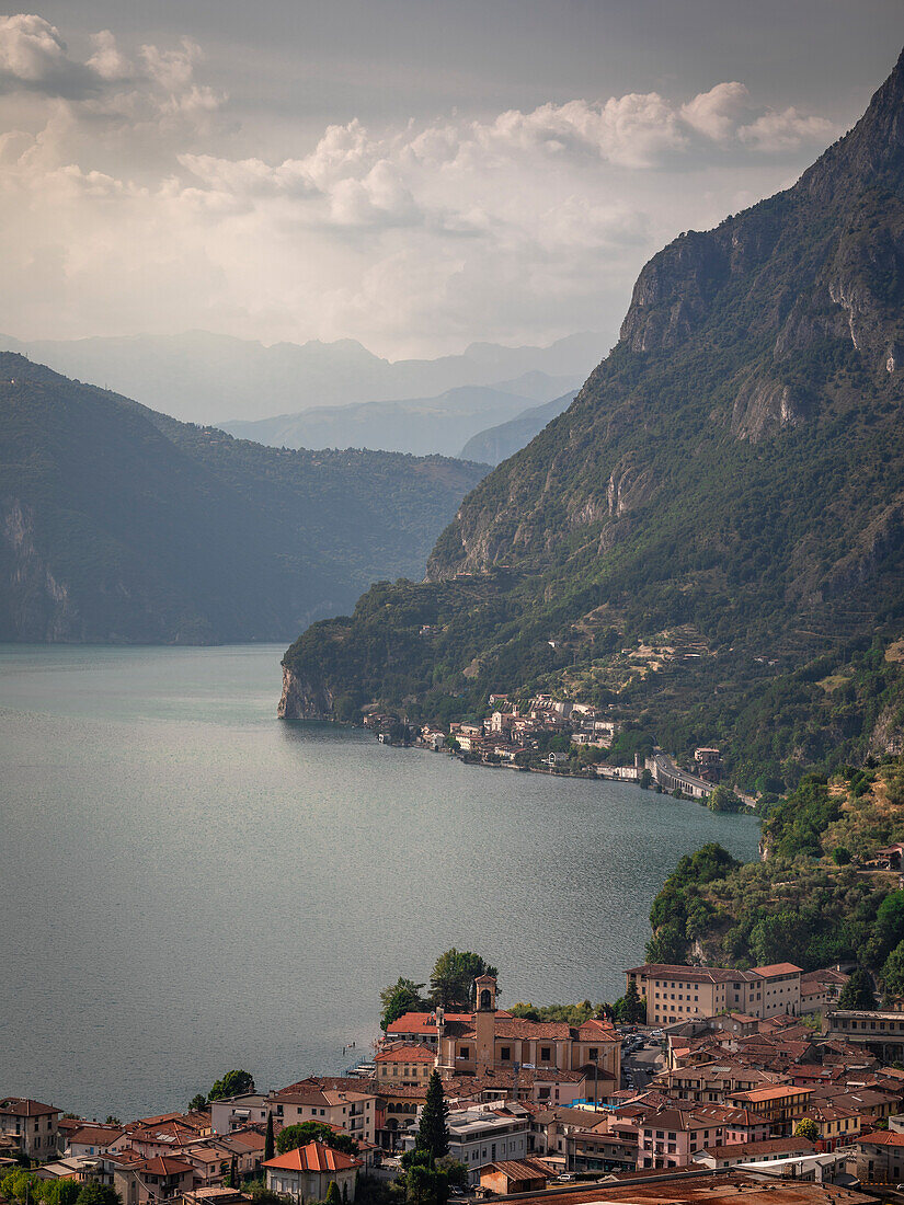 Marone village on Lake Iseo with mountains from above, Italy