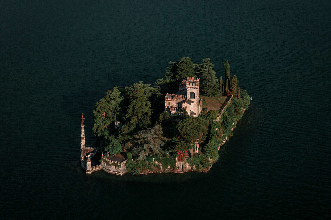Castle Castello della Isola di Loreto on island in Lake Iseo from above, Italy