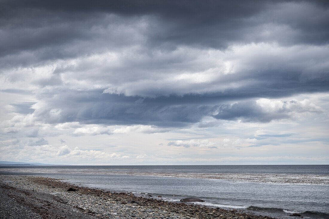 Dramatic clouds on the beach at Puntas Arenas, Patagonia, Magallanes Province, Chile, South America