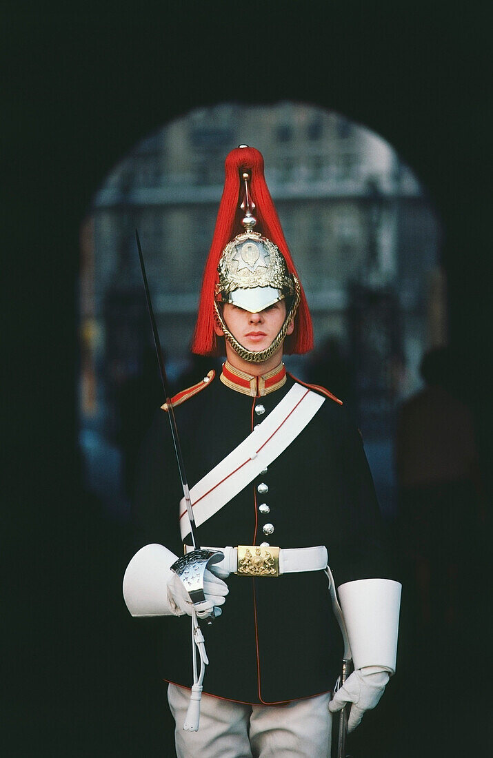 British royal guard holding a sword, London, England