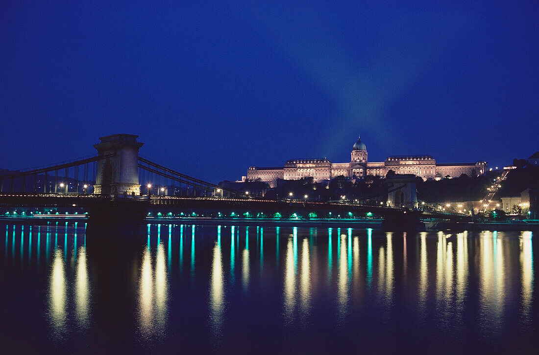 City lit up at night, Chain Bridge, Danube River, Royal Palace Of Buda, Budapest, Hungary