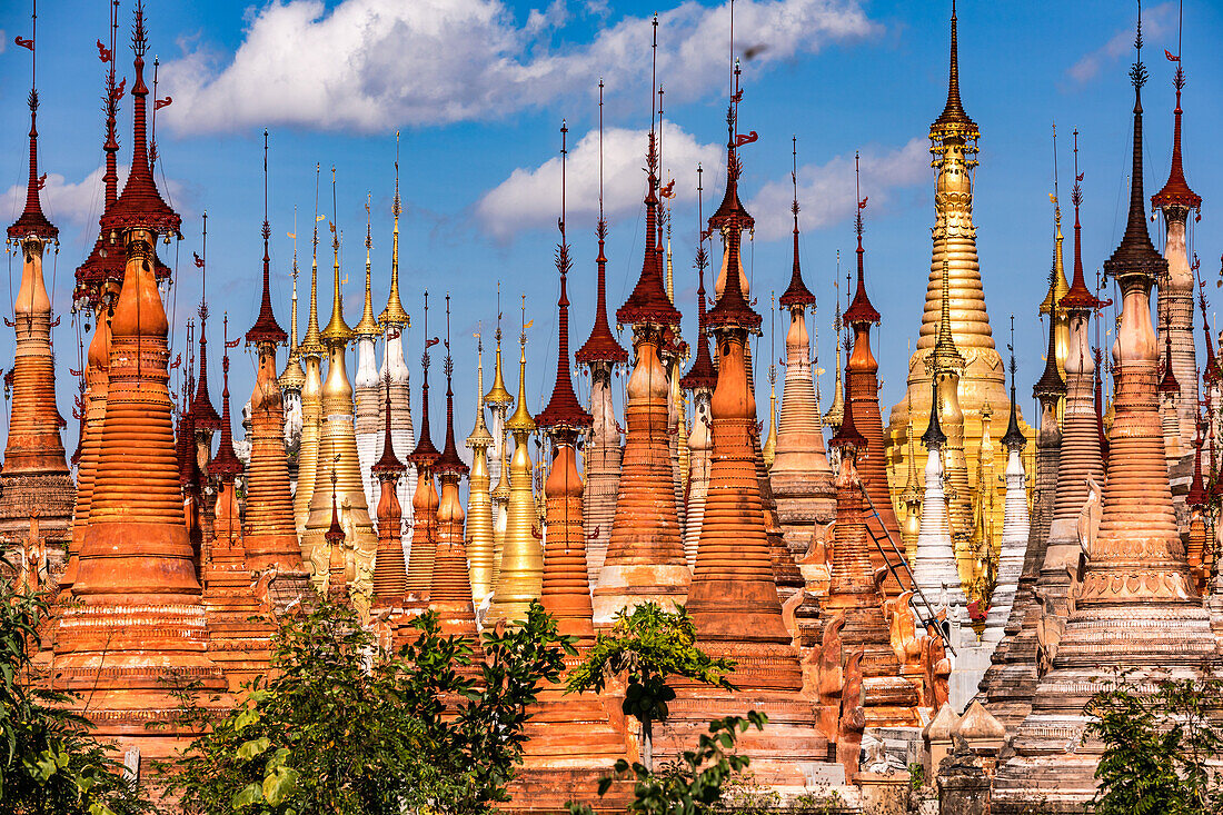 A multitude of grave stupas standing close together in the pagoda forest of In-Dein on Inle Lake in Myanmar