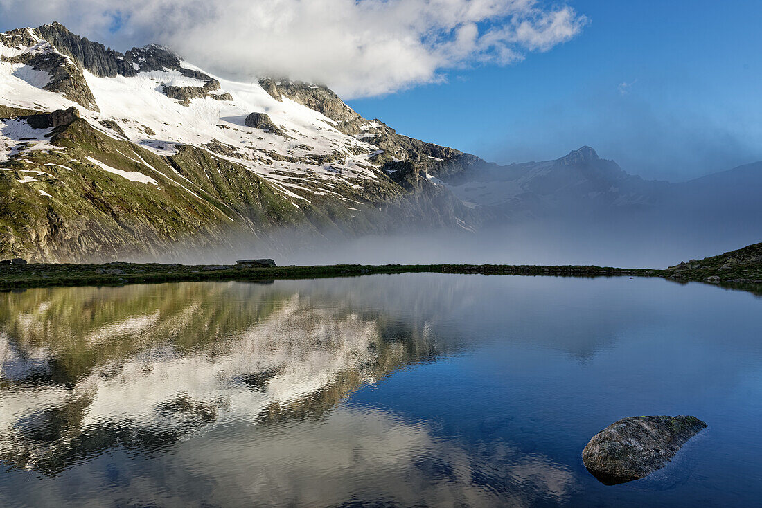 Small lake above Richterhütte, Hohe Tauern National Park, Salzburger Land, Zillertal Alps, Austria.