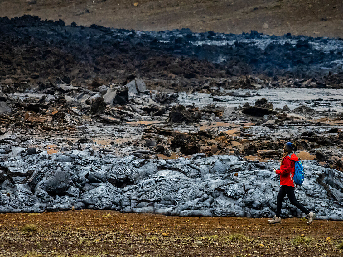 Local Icelanders visiting lava flows from Fagradalsfjall Volcano, Iceland