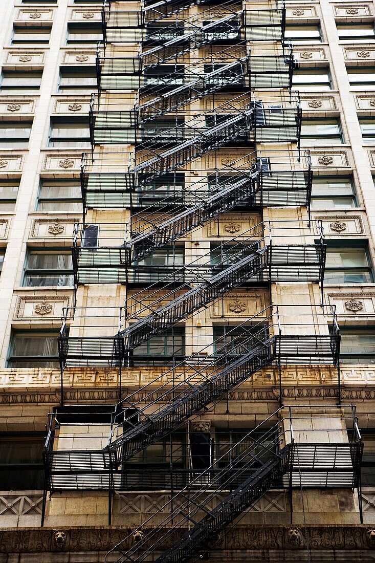 Low angle view of fire escapes outside a building, New York City, New York State, USA