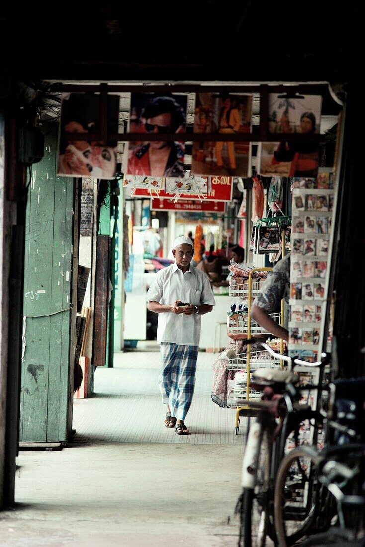 Man walking on the street market, Singapore