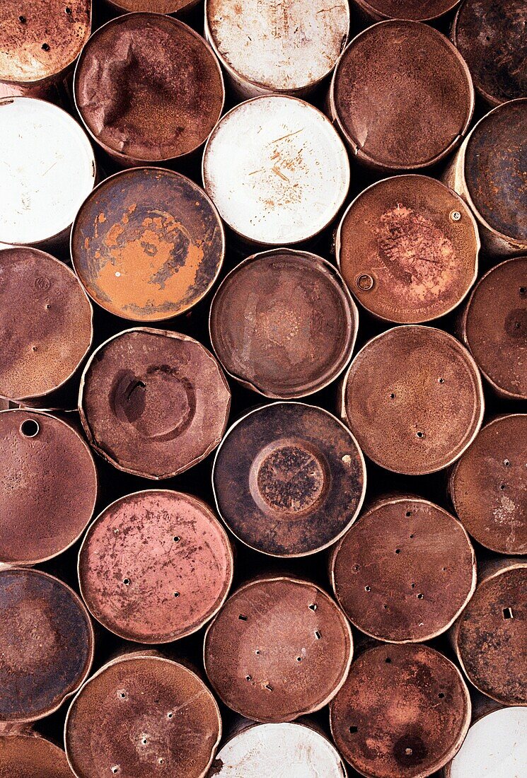 High angle view of a group of rusty barrels, Indonesia