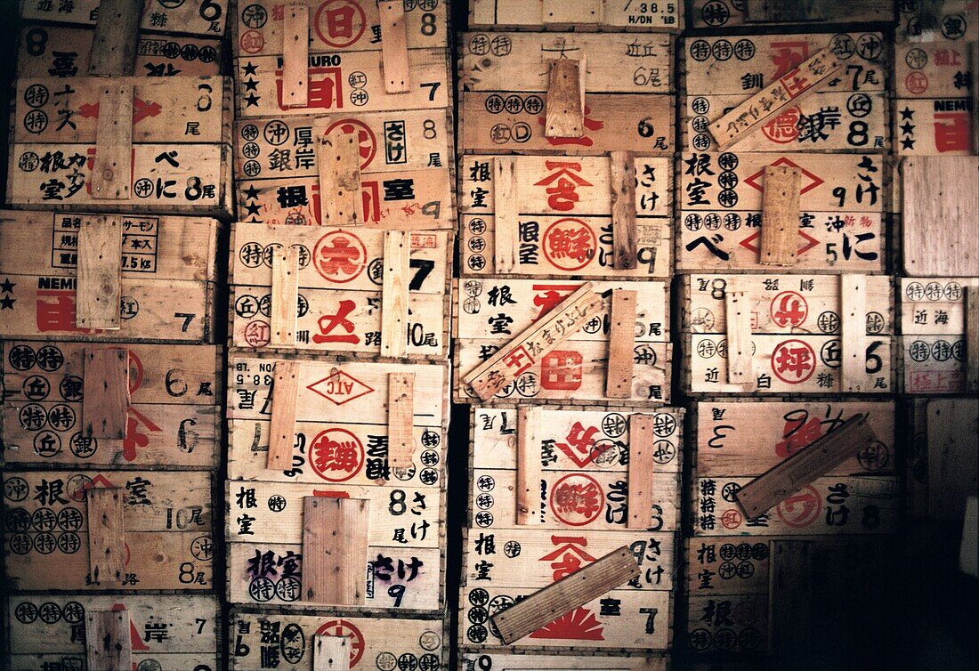 Stacks of wooden shipping crates in a warehouse, Tokyo, Japan