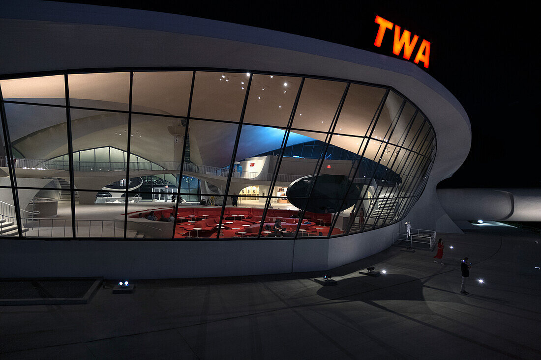 Night exterior of the TWA hotel designed by Eero Saarinen at JFK Airport