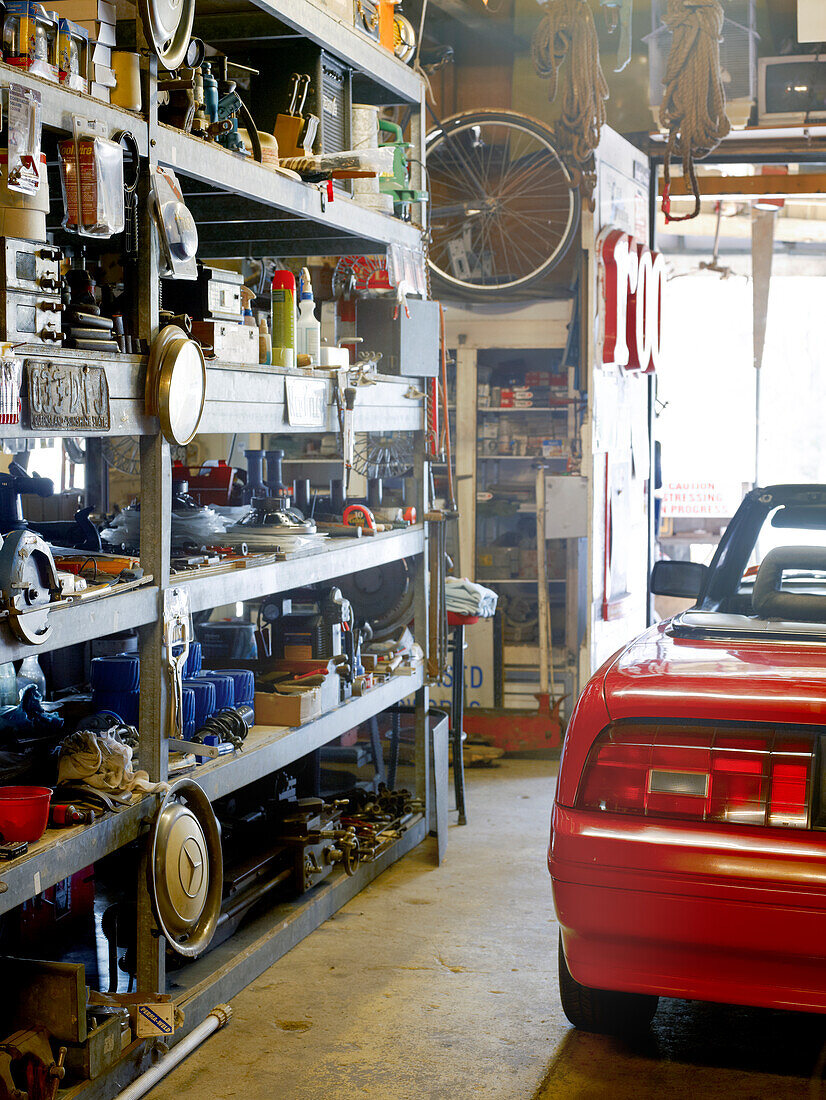 Red Sports Car parked inside workshop at the Broken Spoke Saloon in Pimpama