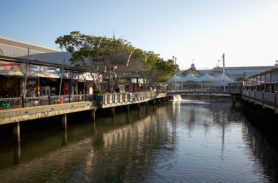 Walkway over man made waterway and shops at Sunshine Plaza - Maroochydore