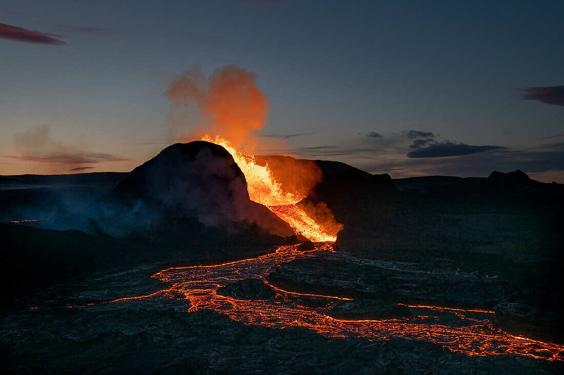 Reykjanes Peninsula, Iceland - May 9th 2021: Geldingadalir eruption at dusk with a lava flow