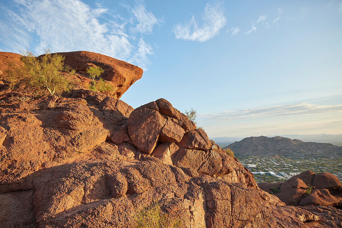 View of Phoenix, Arizona and unique rock formations from Camel Back Mountain trail