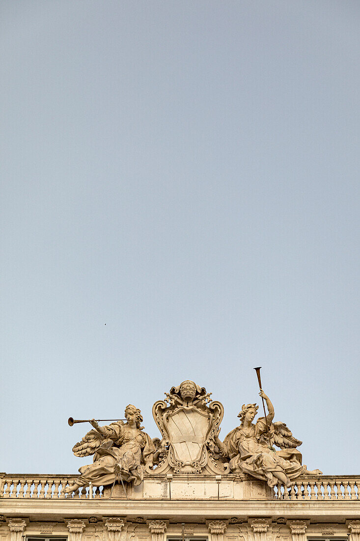 Angels with trumpets on top of the Quirinal Palace presidential palace Rome italy