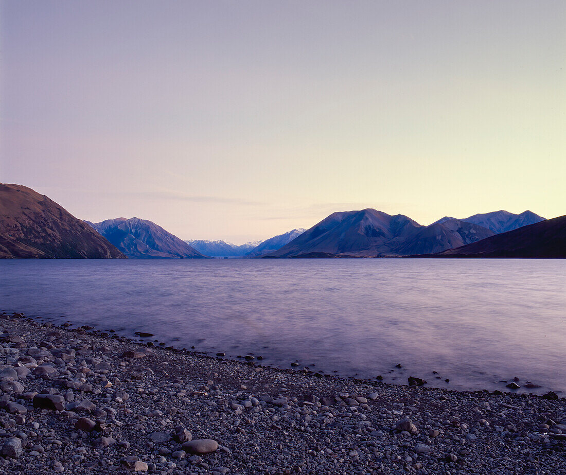 Sunset on Lake Coleridge surrounded by mountains