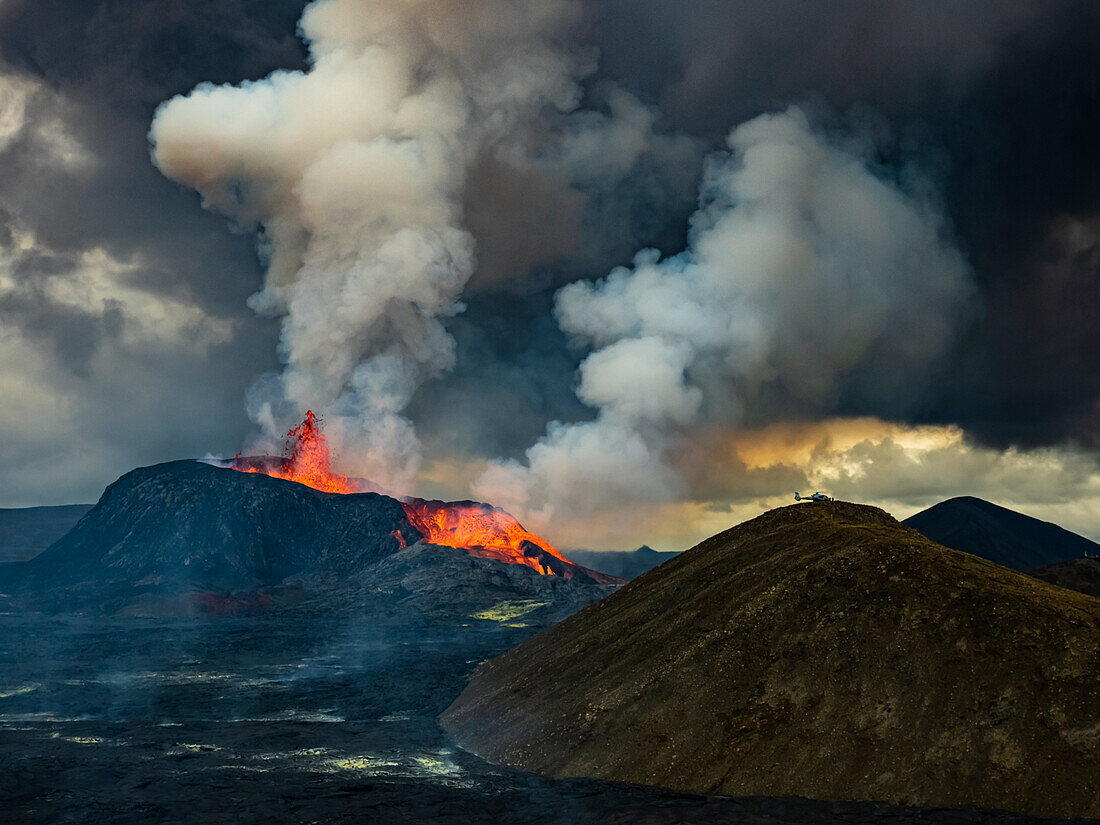 Glowing lava is ejected skyward as lava spills from Fagradalsfjall Volcano, Iceland Fagradalsfjall Volcano, Iceland