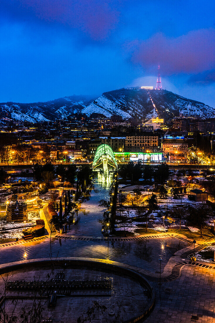 Evening view of Tbilisi's Old town with unusual heave snow