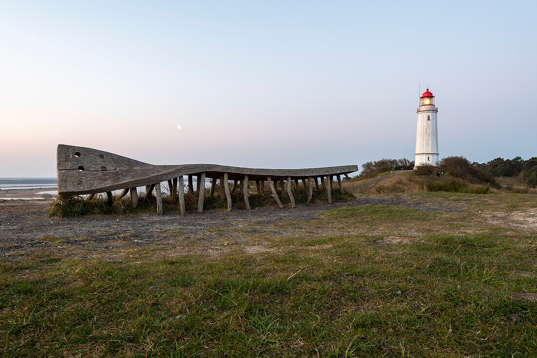 Dornbusch lighthouse on the Schluckwieksberg, left in the sky the moon, Hiddensee Island, Mecklenburg-West Pomerania, Germany