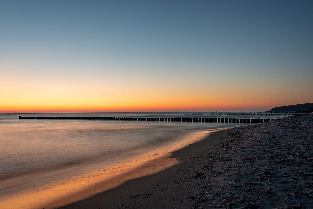 Sunset at the Baltic Sea, breakwater, groynes, Vitte, Hiddensee, Mecklenburg-West Pomerania, Germany