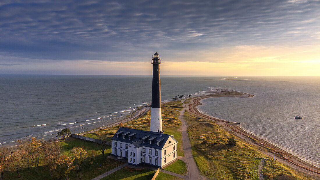 Sorve Tuletorn Lighthouse, Saare, Saaremaa, Estonia, Blatikum, Baltic Sea. Aerial view, sunset