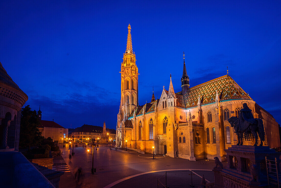 The illuminated Matthias Church during the blue hour in Budapest, Hungary