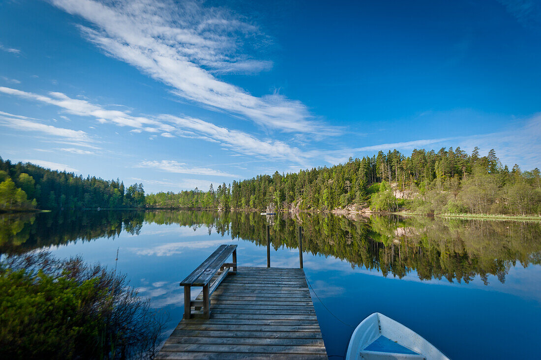 Lake with jetty and boat, Blekinge, Sweden