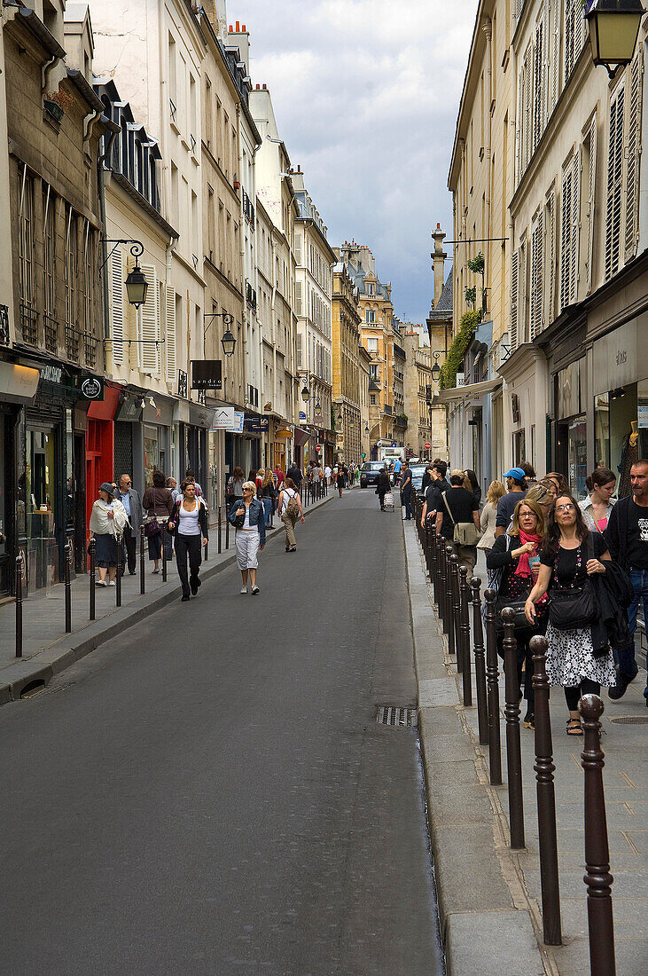 Rue des Francs Bourgeois streetscene with people, The Marais , Paris, France