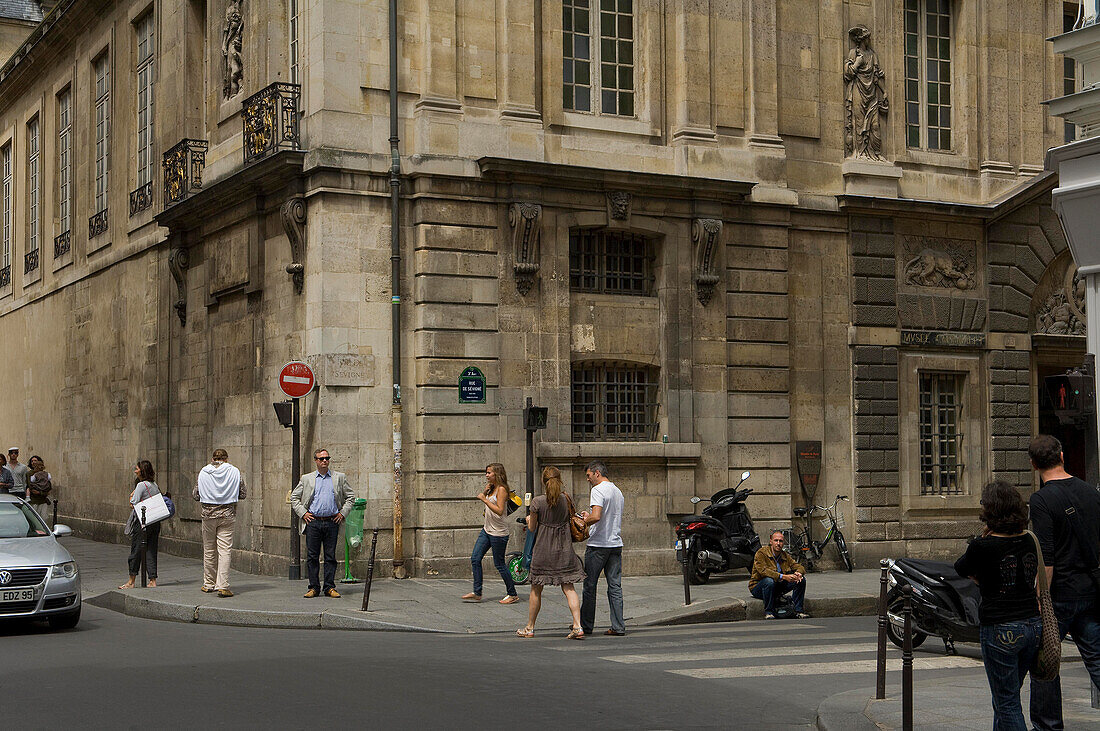 Musee Carnavalet, Rue des Francs Bourgeois streetscene with people, The Marais, Paris, France