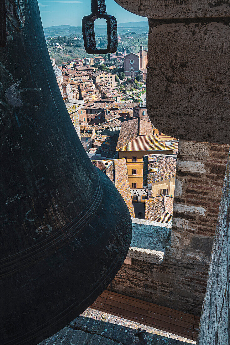 View from Torre Del Mangia tower on old town, bells in foreground, Siena, Tuscany, Italy, Europe
