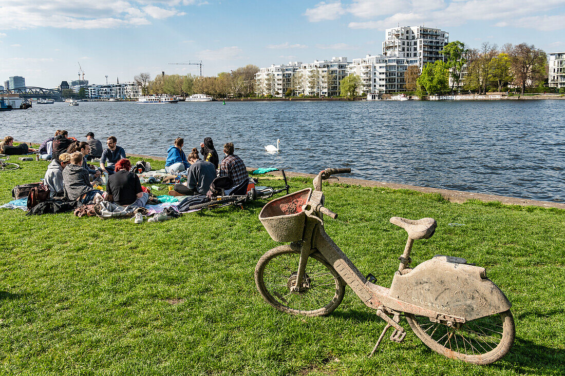 Rental bike full of mud on the banks of the Spree in Treptower Park, vandalism, Berlin