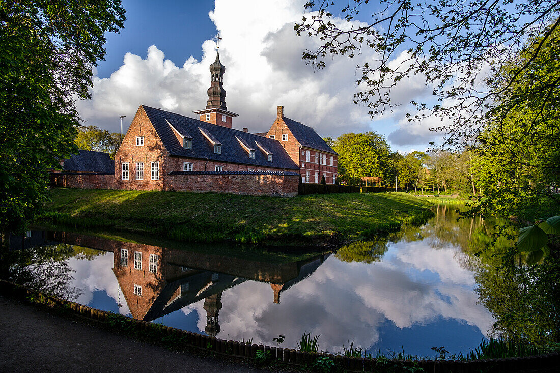 Reflection of Husum Castle in the pond, North Friesland, North Sea coast, Schleswig Holstein, Germany, Europe